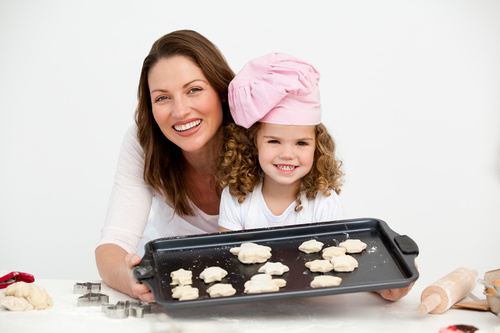Mother and daughter making cookies together Stock Photo 09