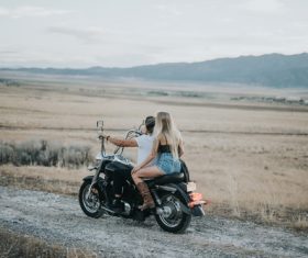 Motorcycle couple back shadow Stock Photo
