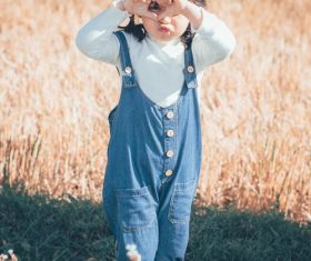 Naughty cute little girl Stock Photo