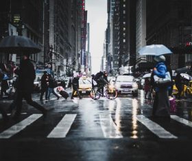 Pedestrians on the street in rainy weather Stock Photo
