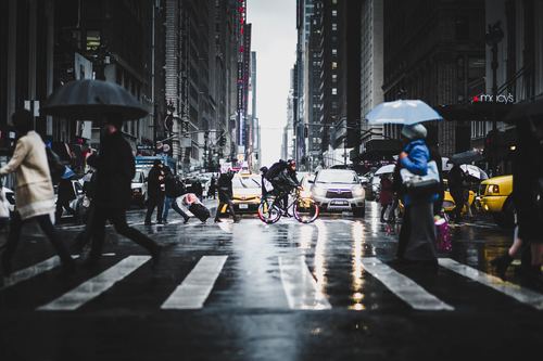 Pedestrians on the street in rainy weather Stock Photo