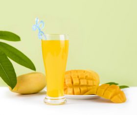 Sliced mango and freshly squeezed mango juice Stock Photo 01