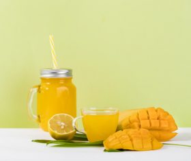 Sliced mango and freshly squeezed mango juice Stock Photo 03