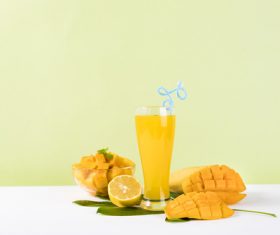 Sliced mango and freshly squeezed mango juice Stock Photo 04
