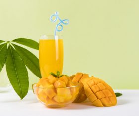 Sliced mango and freshly squeezed mango juice Stock Photo 05