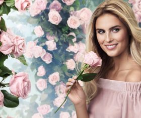 Smiling beautiful woman with different flowers background Stock Photo 05