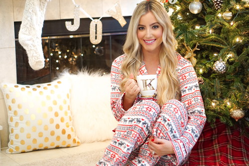 Stock Photo Girl wearing pajamas drinking coffee