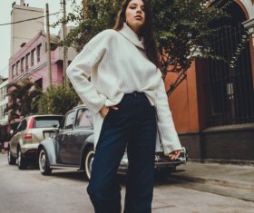 Street beat sweater jeans beauty Stock Photo