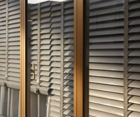 Window with sand coloured roll sun blinds Stock Photo 05