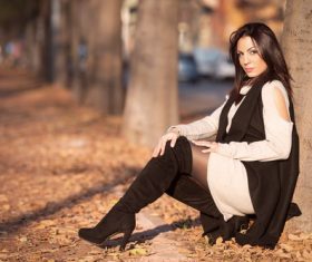 Woman posing on the street in autumn outdoor Stock Photo