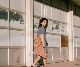 Woman turns back on the street Stock Photo