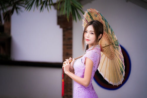Asian girl with an umbrella Stock Photo