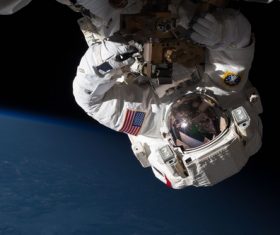 Astronaut walking maintenance in space Stock Photo 02