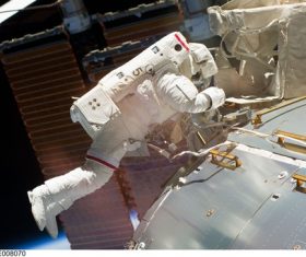 Astronaut walking maintenance in space Stock Photo 04