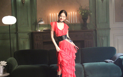Beautiful Asian girl in red dress Stock Photo