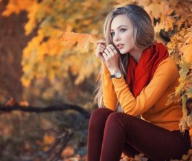Beautiful girl and autumn maple Stock Photo