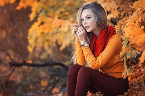 Beautiful girl and autumn maple Stock Photo