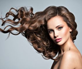 Beautiful woman with long brown curly hair Stock Photo 06