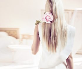 Elegant young blonde holding a beautiful pink rose Stock Photo 04