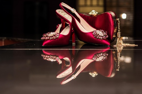 Female wedding red high heels and bag Stock Photo