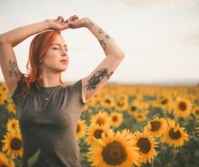 Flower sea woman meditating Stock Photo