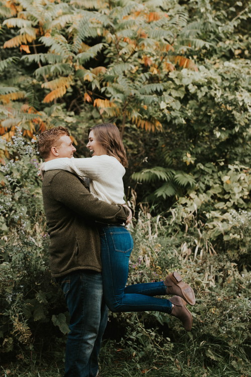 Happy hugging couple outdoors Stock Photo