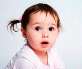 Little girl with big eyes Stock Photo