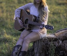 Man and woman playing guitar Stock Photo 02
