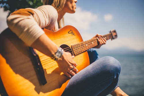 Man and woman playing guitar Stock Photo 05