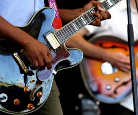 Man and woman playing guitar Stock Photo 06