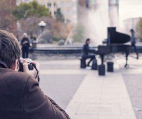 Photographer Musician Stock Photo