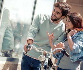 Portrait of a couple with shopping bags in city Stock Photo 02