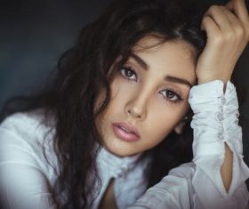 Pretty girl looking at you Stock Photo