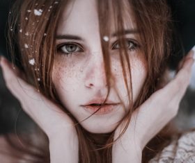 Snow flakes on the girl hair Stock Photo