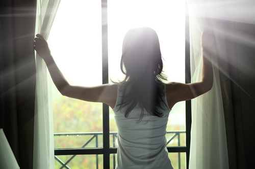 Stock Photo Woman opens the curtain 02