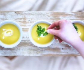 leek and potato soup hand Stock Photo