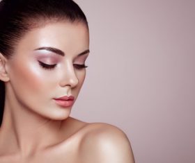 Beautiful woman face makeup artist applies eyeshadow Stock Photo 03