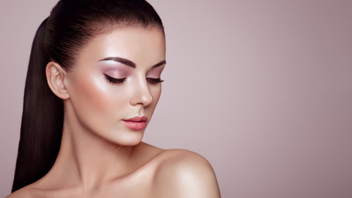 Beautiful woman face makeup artist applies eyeshadow Stock Photo 03
