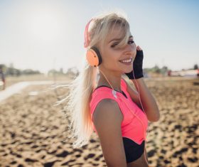 Beautiful woman listening to music Stock Photo 04