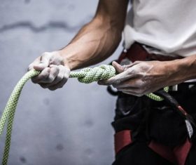 Checking rock climbing rope people Stock Photo