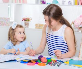 Daughter looking at mom Stock Photo