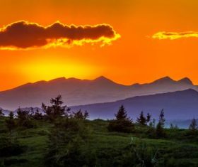 Dusk evening mountains bushes natural scenery Stock Photo