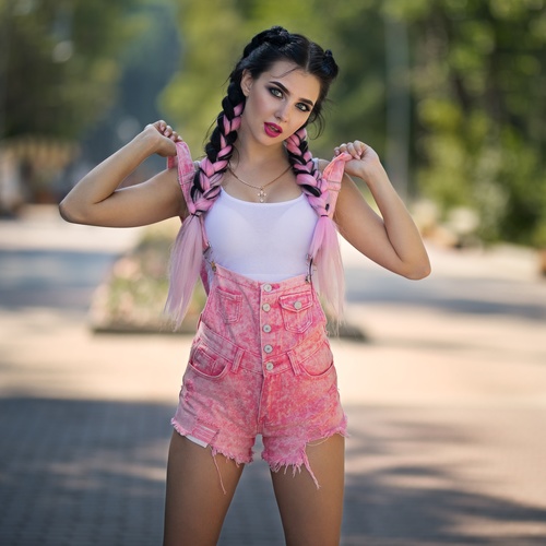 Fashion girl in pink shorts Stock Photo