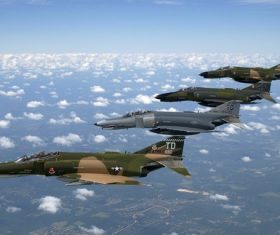 Four fighters in the air formation Stock Photo