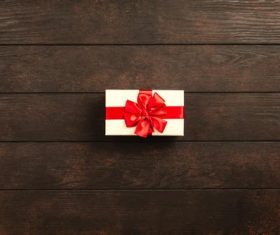 Gift box close-up on wooden table Stock Photo