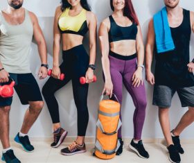 Group of athletic young peoples making exercise at the gym Stock Photo 01