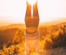 Handstand woman Stock Photo