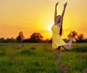 Happy girl in yellow dress Stock Photo