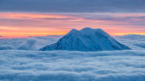 High mountains in thick clouds Stock Photo