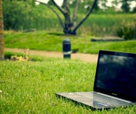 Laptop on the lawn Stock Photo